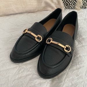 Black loafers